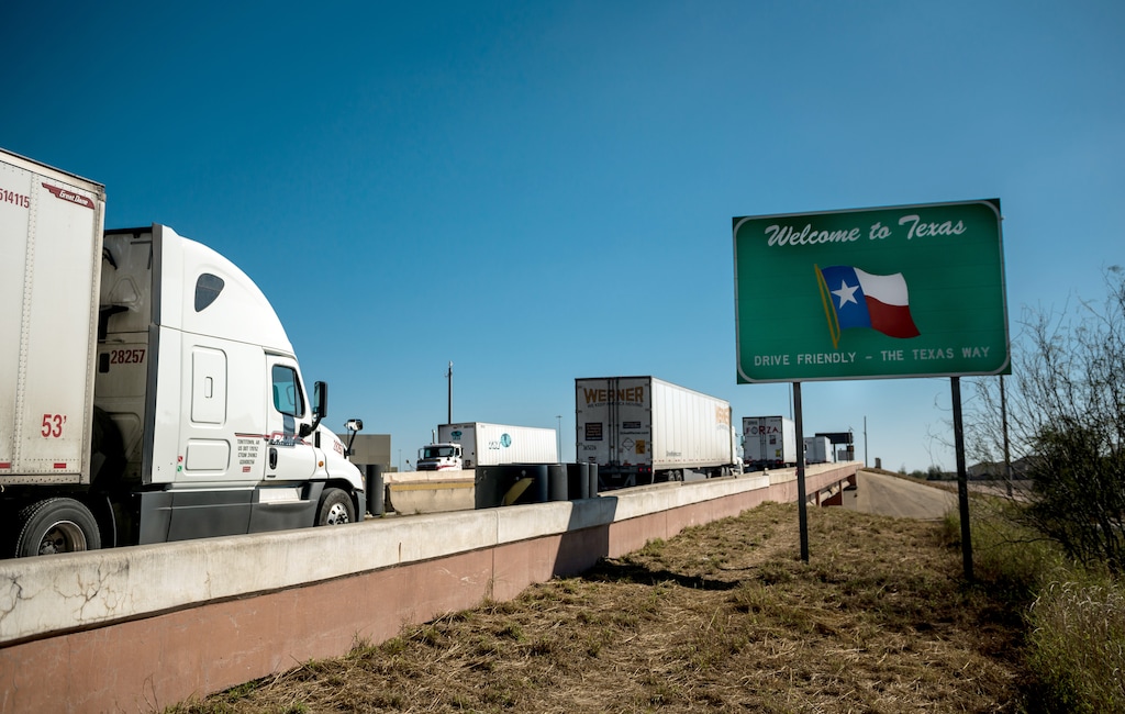 (Meredith Kohut | The New York Times) Trucks enter Laredo, Texas, after crossing from Nuevo Laredo, Mexico, Jan. 12, 2019. Congress gave final approval to President Donald Trump’s revised North American Free Trade Agreement on Jan. 16, 2020, as House lawmakers prepared to read charges of high crimes and misdemeanors on the Senate floor.