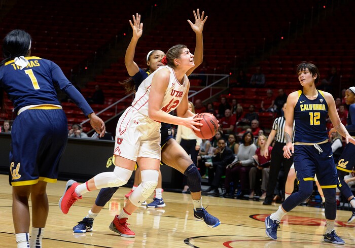 Scott Sommerdorf   |  The Salt Lake Tribune  
Utah Utes forward Emily Potter (12) turns to shoot during second half play. Utah beat Cal 63-57, Sunday, January 15, 2017. 
