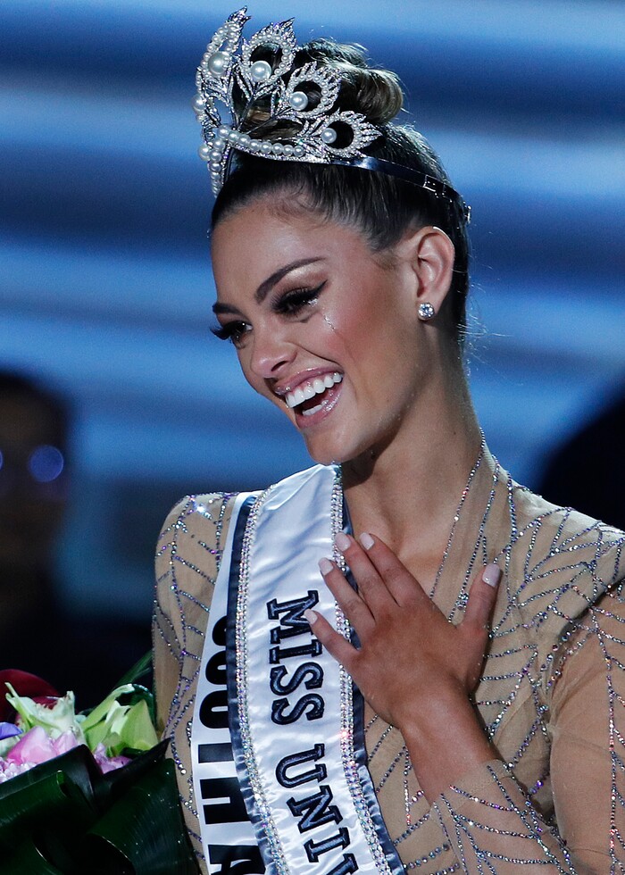 (John Locher | The Associated Press) Miss South Africa Demi-Leigh Nel-Peters cries after she was announced as the new Miss Universe at the Miss Universe pageant Sunday, Nov. 26, 2017, in Las Vegas.