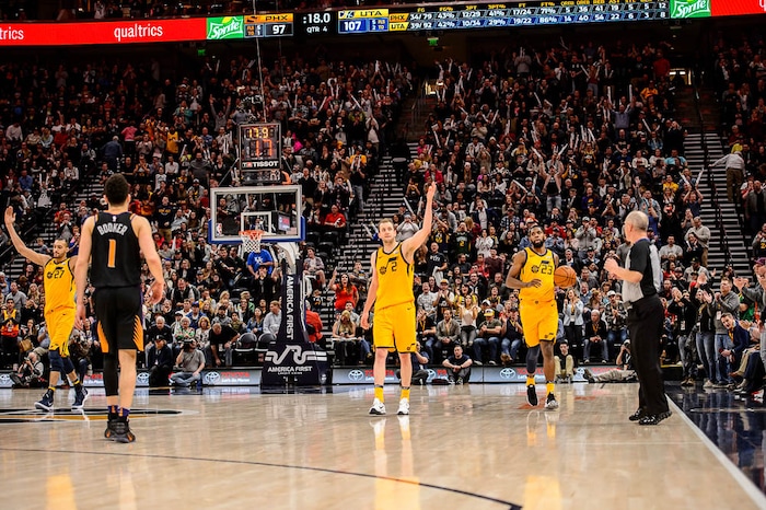 (Trent Nelson | The Salt Lake Tribune)  Utah Jazz center Rudy Gobert (27), Utah Jazz forward Joe Ingles (2), Utah Jazz forward Royce O'Neale (23) celebrate as time runs out as the Utah Jazz host the Phoenix Suns, NBA basketball in Salt Lake City, Wednesday Feb. 14, 2018.