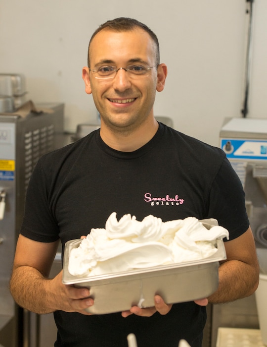 (Rick Egan | Tribune file photo) Francesco Amendola holds freshly made lemon sorbet at his Sweetaly gelato shop on 3300 South on June 3, 2016.