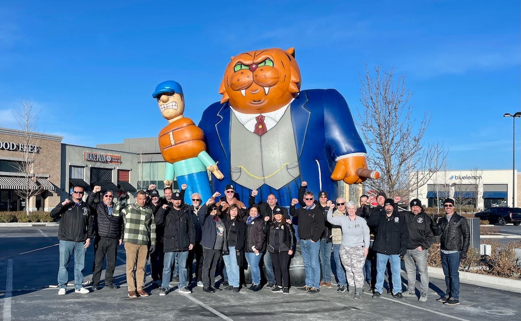 (Doug Bloch) AAA insurance sales agents organized with the Teamsters rallied outside a AAA meeting in Farmington, Utah, on Wednesday, March 2, 2022.