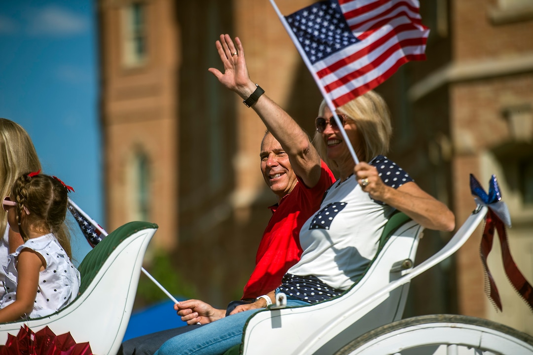 (Chris Detrick  |  Tribune file photo)  Provo Mayor John Curtis and his family wave to the crowd during the annual Freedom Festival Grand Parade in downtown Provo Tuesday, July 4, 2017. 