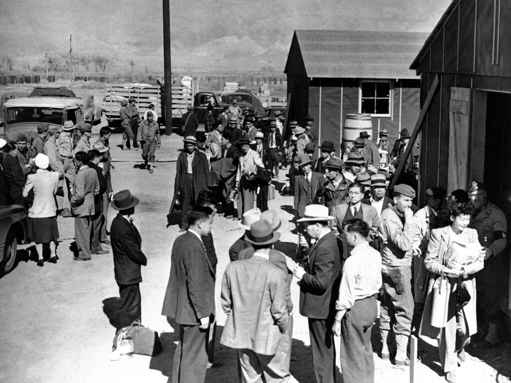 (AP Photo/File)
This March 23, 1942, photo shows the first arrivals at the Japanese evacuee community established in Owens Valley in Manzanar, Calif. Roughly 120,000 Japanese immigrants and Japanese-Americans were sent to camps that dotted the West because the government claimed they might plot against the U.S. The location is featured in a collection of mini-essays by American writers published online by the Frommer's guidebook company about places they believe helped shape and define America.