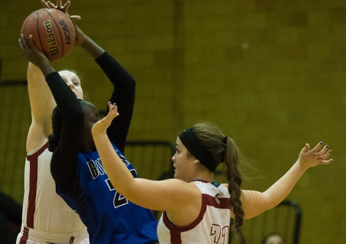 (Rick Egan  |  The Salt Lake Tribune)    Bingham High guard, Shanyce Makuei (20) is double-teamed by  Mercedes Staples (12),  and Madi Toole, Viewmont, in prep basketball action, Bingham vs. Viewmont, in Bountiful, Wednesday, January 3, 2018.