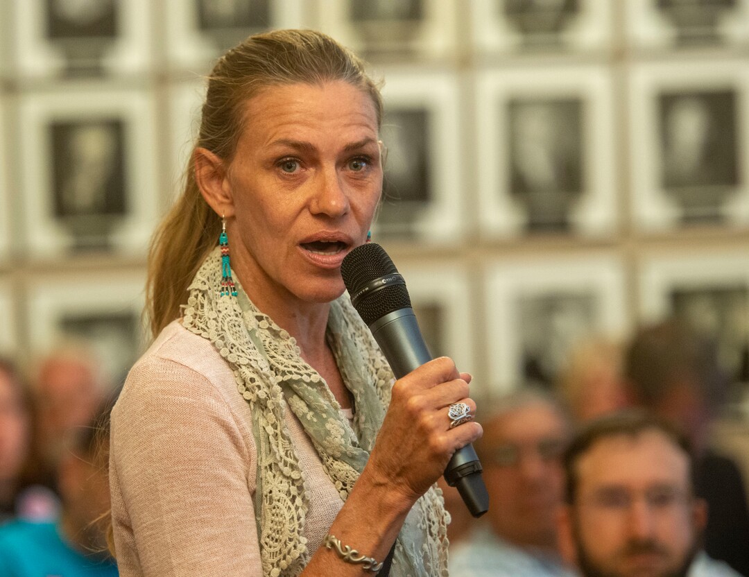 (Rick Egan  |  The Salt Lake Tribune)     Robyn Adamson urges the City Council to vote no on a proposal that would grant up to $28 million in tax increment reimbursement to a developer seeking to build a 3,000 acre industrial development in the city’s northwest side, The council voted yes on the proposal, during a Salt Lake City Council redevelopment agency meeting. Tuesday, Aug. 27, 2019.