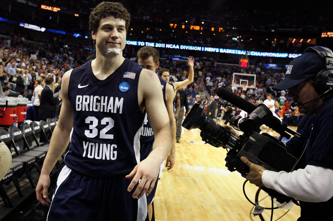 (Scott Sommerdorf | Tribune file photo) BYU guard Jimmer Fredette (32) makes his exit from the NCAA tournament and college basketball as he walks off the court after BYU lost 83-74 in OT to Florida at the New Orleans Arena in their first round game of the "Sweet Sixteen", Thursday, March 24, 2011.