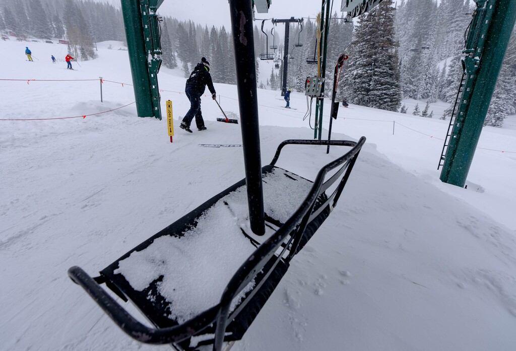 (Francisco Kjolseth | The Salt Lake Tribune) The Albion lift nears its final turns at Alta as skiers get a chance to ride the two-person lift one last time before closing for good on Tuesday, April 12, 2022. After 60 years in operation, the old two-person lift, along with the Sunnyside lift that serves the same area, in in the process of being replaced with a six-person high-speed lift.
