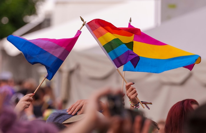 (Leah Hogsten | The Salt Lake Tribune)  Pride festival revelers dance to the music of OneUpDuo at the Utah Pride Festival at Washington Square, Saturday, June 4, 2022. 