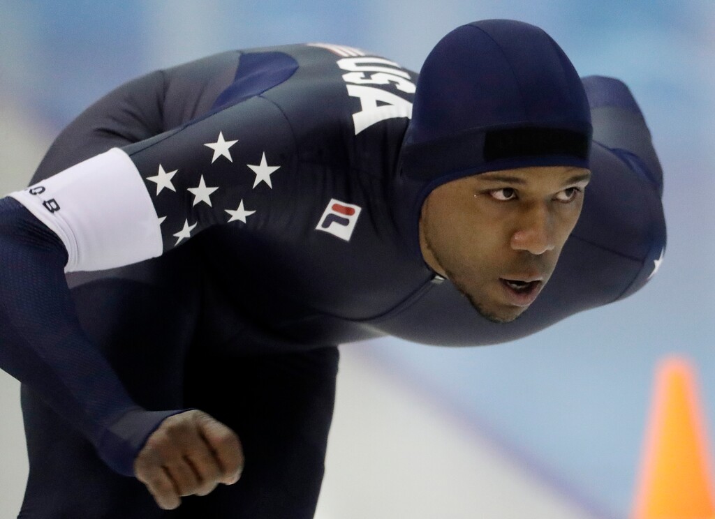 Shani Davis competes in the men's 1,000 meters during the U.S. Olympic long track speedskating trials, Wednesday, Jan. 3, 2018, in Milwaukee. (AP Photo/Morry Gash)