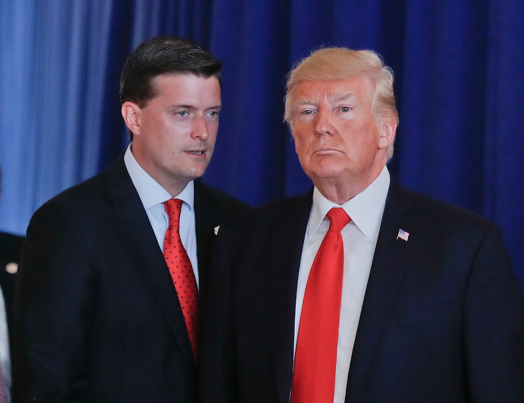 (Pablo Martinez Monsivais | AP file photo) In this Aug. 12, 2017, photo, Rob Porter, left, White House Staff Secretary, speaks to President Donald Trump after Trump made remarks regarding the ongoing situation in Charlottesville, Va., at Trump National Golf Club in Bedminister, N.J. The White House has instructed Porter and another former aide to President Donald Trump not to appear at a House Judiciary Committee hearing Tuesday, Sept. 17, 2019, saying Porter and Rick Dearborn are "absolutely immune" from testifying at what the panel is calling its first impeachment hearing.