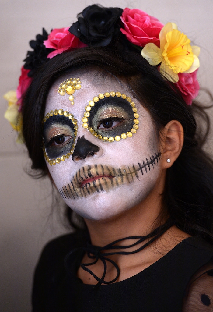 (Leah Hogsten | The Salt Lake Tribune) Costume contestant at the Day of the Dead festival Saturday, October 21, 2017 at the Capitol.