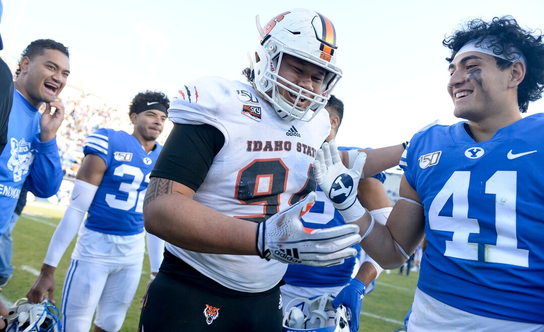 (Leah Hogsten  |  The Salt Lake Tribune) Idaho State Bengals defensive lineman Kainoa Fuiava (94) is greeted after the game. Brigham Young University defeated  Idaho State 41-10, Saturday, Nov. 16, 2019 at LaVell Edwards Stadium.