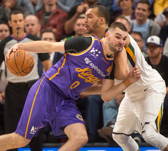 (Rick Egan  |  The Salt Lake Tribune) Utah Jazz center Rudy Gobert (27) holds his ground as Sydney Kings guard Isaac Humphries (0) tries to work the ball inside,  in preseason basketball  action, Utah Jazz vs. Sydney Kings, in Salt Lake City, Sunday, October 2, 2017.


