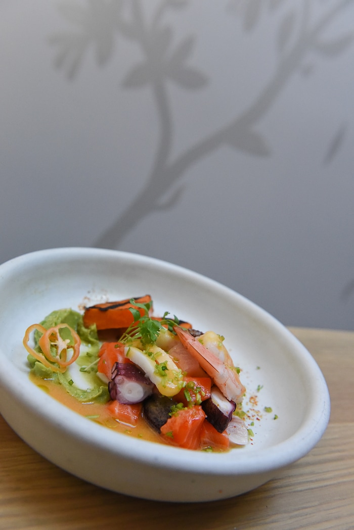 (Francisco Kjolseth  |  The Salt Lake Tribune)  Ceviche Mixto at the Post Office Place, a new bar by the same owners as Takashi, located next door, welcomes patrons on Tuesday, June 19, 2018. One of the main reasons Takashi and Tamara Gibo opened this downtown watering hole is so that their patrons could have a drink while waiting for a seat at Takashi where the wait can sometimes be an hour long and liquor laws don't allow cocktails unless you are seated.