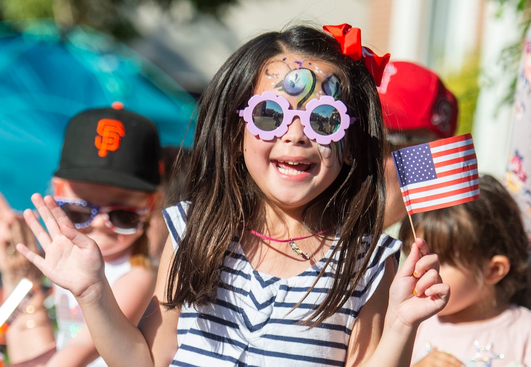 (Rick Egan  |  The Salt Lake Tribune)    Devon Hotler 6, cheers for one of the entries in the Bountiful Handcart Days Parade, Friday, July 19, 2019.