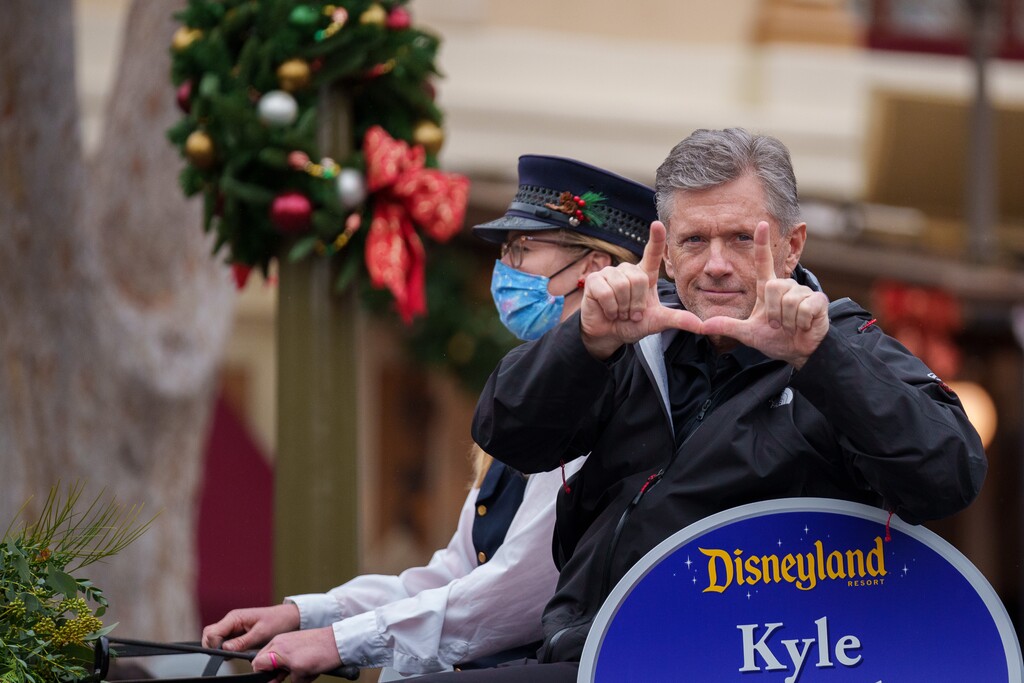 (Trent Nelson  |  The Salt Lake Tribune) Utah football coach Kyle Whittingham rides down Disneyland's Main Street in the Rose Bowl Game Cavalcade in Anaheim, Calif., on Monday, Dec. 27, 2021.