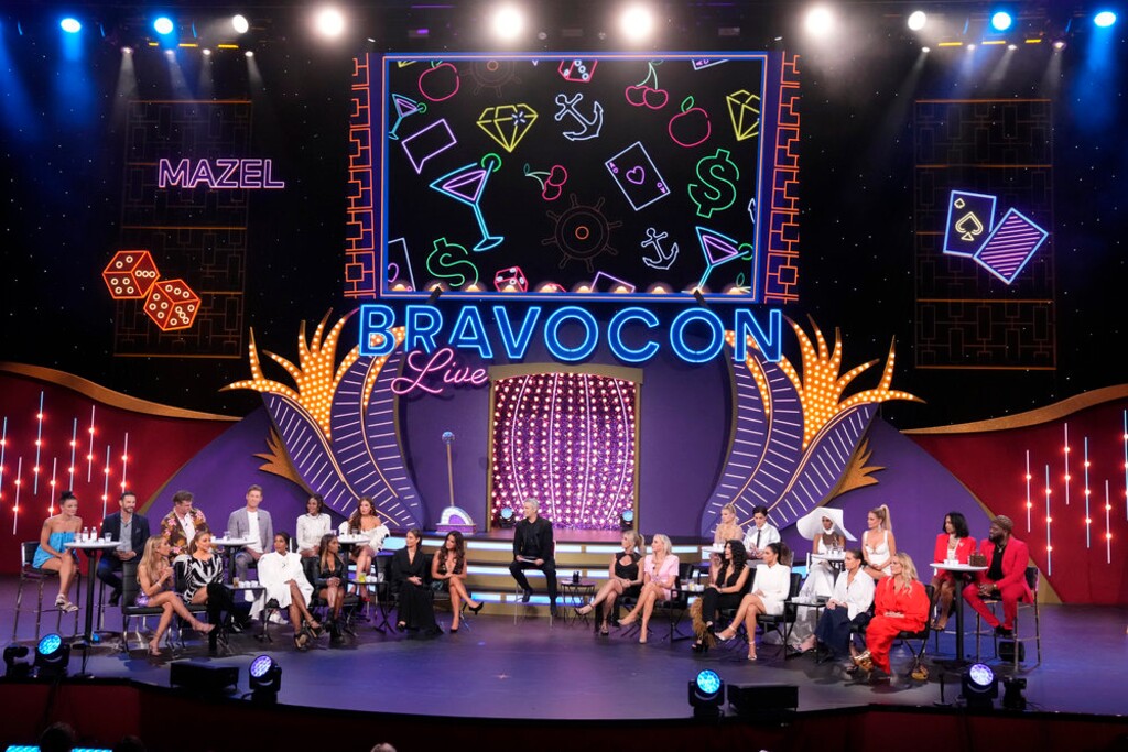 (Charles Sykesn | Bravo) Meredith Marks and Heather Gay of "The Real Housewives of Salt Lake City" (lower right) are two of the panelists in a session at BravoCon 2023 in Las Vegas.