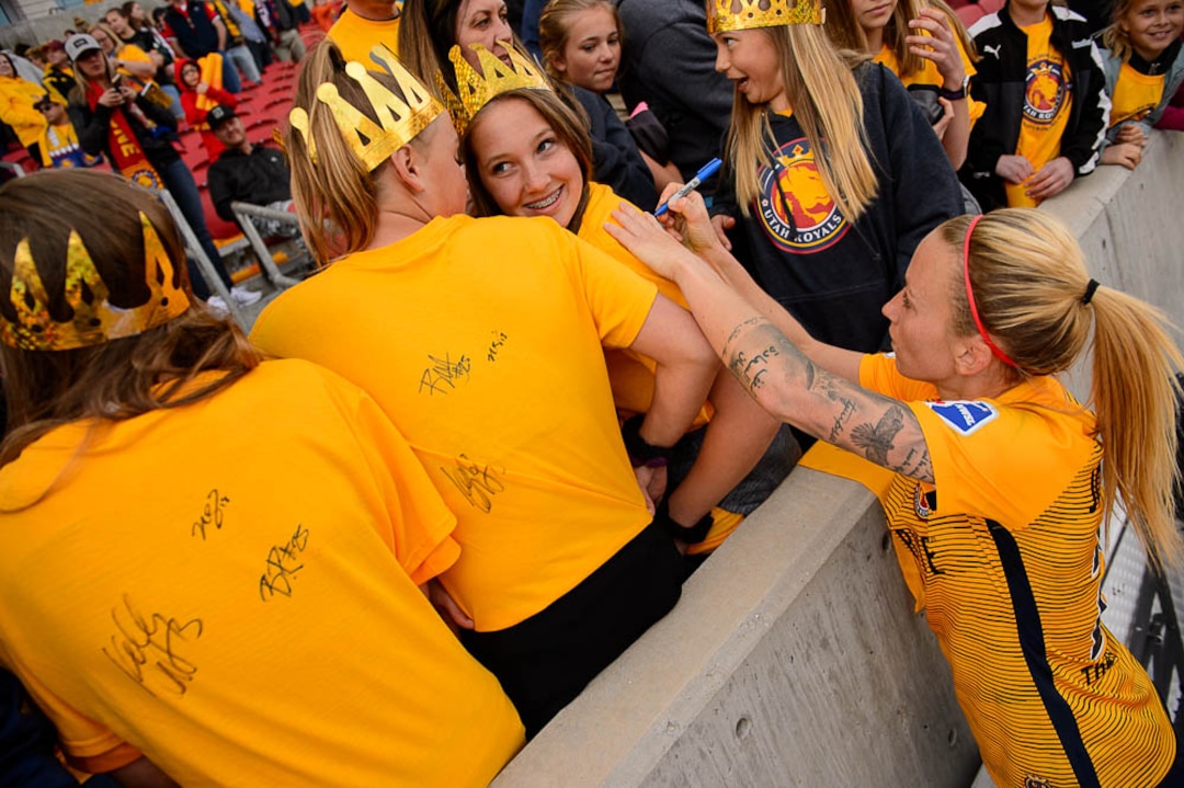 (Trent Nelson | The Salt Lake Tribune)  Utah Royals FC hosts the Chicago Red Stars, at Rio Tinto Stadium in Sandy, Saturday April 14, 2018. Utah Royals FC midfielder Gunnhildur Jónsdóttir (23) signs autographs on fans' t-shirts.