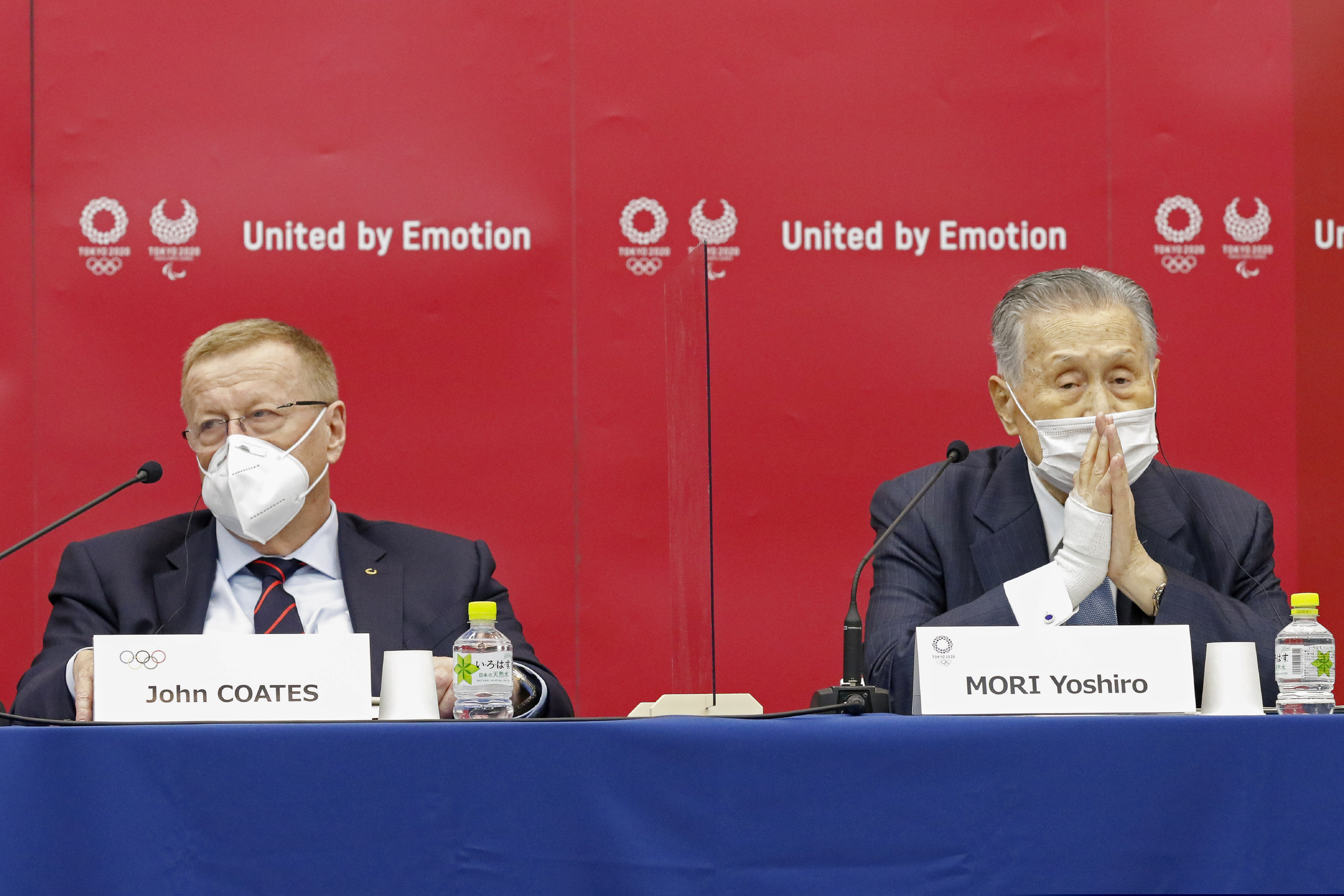 (Rodrigo Reyes Marin | Pool photo via AP) Yoshiro Mori, president of the Tokyo 2020 organizing committee, right, sits with John Coates, chairman of the Coordination Commission for the Tokyo 2020 Olympics, during a press conference in Tokyo, Wednesday, Nov. 18, 2020.