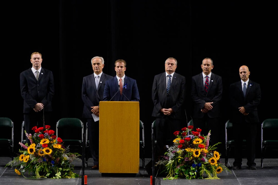 (Trent Nelson | The Salt Lake Tribune)  Bishop Steve Tingey conducts funeral services for Jill Robinson, a West Valley City code-enforcement officer killed on the job last week. The service took place at the Maverik Center in West Valley City on Friday Aug. 17, 2018.