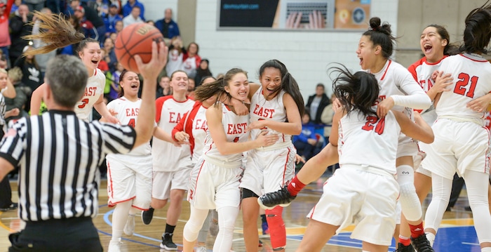 (Leah Hogsten  |  The Salt Lake Tribune) East celebrates the win.  East defeated Timpview 68-48 to win the the 5A High School Girls' Basketball Tournament title at SLCC in Taylorsville, Saturday, Feb. 24, 2018. 