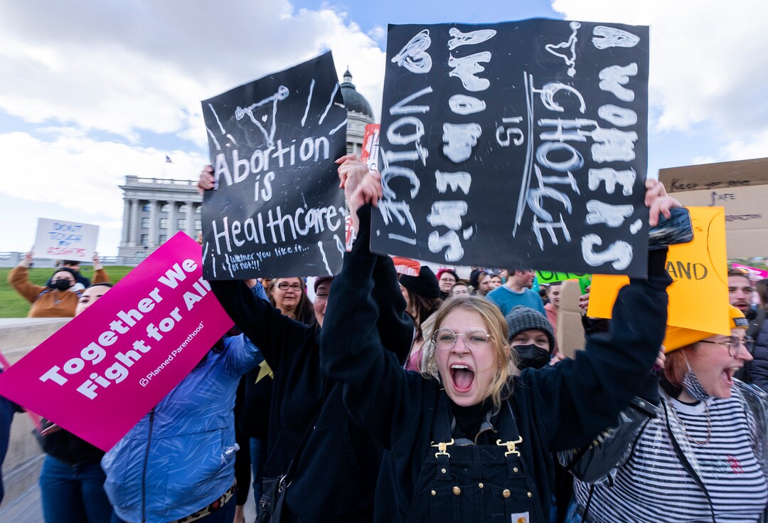 (Rick Egan | The Salt Lake Tribune) Hundreds of protesters march down State Street after a bans off our bodies protest hosted by Planned Parenthood, on Tuesday, May 3, 2022.