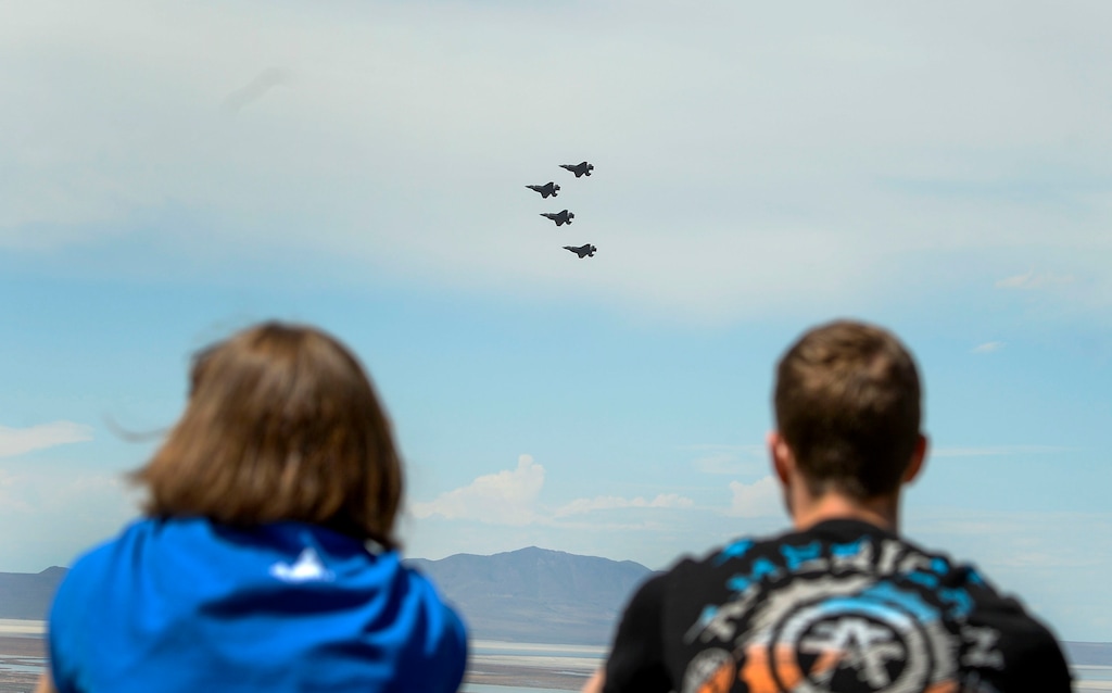 (Leah Hogsten  |  The Salt Lake Tribune) Onlookers lined Bountiful Blvd. to get a glimpse of the F-35s passing through Davis County.  In support of the healthcare workers, first responders and essential personnel on the front lines of the fight against COVID-19, Hill Air Force Base's F-35 pilots from the Demo Team and the 388th Fighter Wing flew over the state, April 30, 2020.
