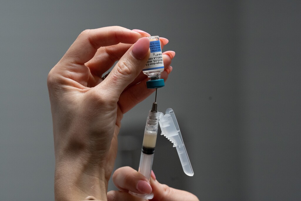 (Mary Conlon | AP) A nurse prepares a combination measles, mumps and rubella vaccine earlier this year. Utah has become the "new center" of U.S. measles cases.