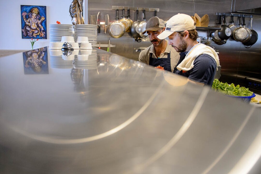 (Trent Nelson | The Salt Lake Tribune)
Omar Abou-Ismail and Adrien Raigne in the kitchen at Rawtopia Living Cuisine, in Millcreek.