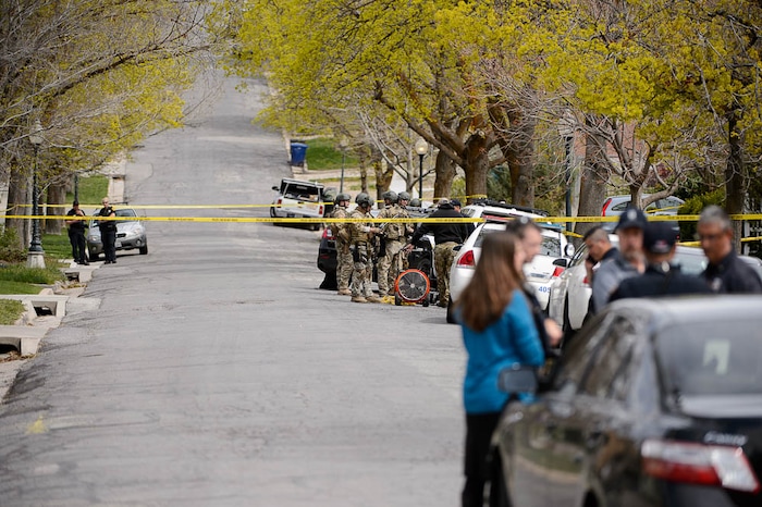 (Trent Nelson | The Salt Lake Tribune)  
Law enforcement at the scene after an incident where a man barricaded himself in a house on Princeton Avenue near 1100 East in Salt Lake City, Wednesday April 18, 2018.