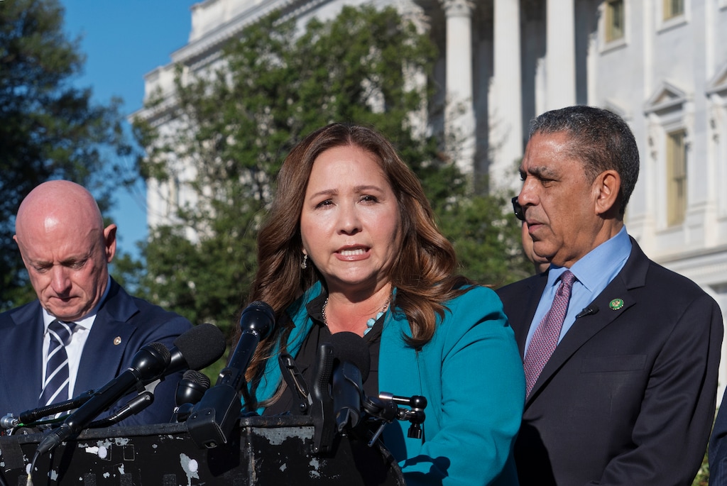 Rep.-elect Adelita Grijalva, D-Ariz., speaks as she is surrounded by supporters who have urged that Speaker Mike Johnson swear her in, at the Capitol in Washington, Wednesday, Oct. 15, 2025. (AP Photo/J. Scott Applewhite)