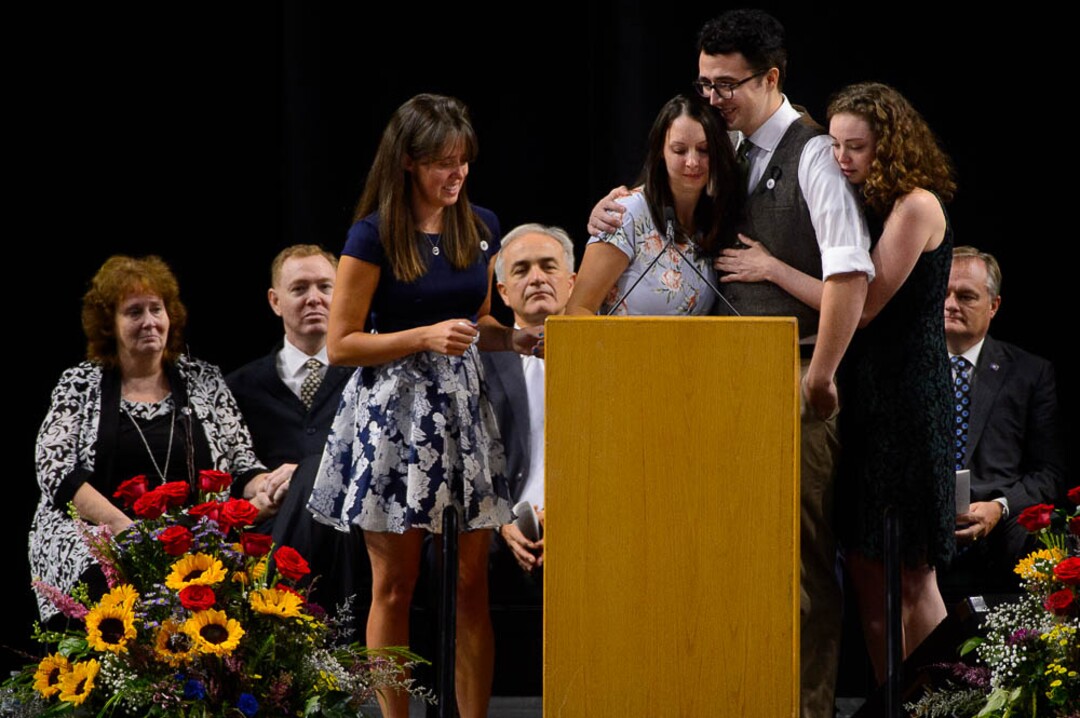 (Trent Nelson | The Salt Lake Tribune)  
Jill Robinson's children, Katie Merrill, Jessica Knorr, Riley Merrill, and Halie Merrill speak at funeral services for Jill, a West Valley City code-enforcement officer killed on the job last week. The service took place at the Maverik Center in West Valley City on Friday Aug. 17, 2018.