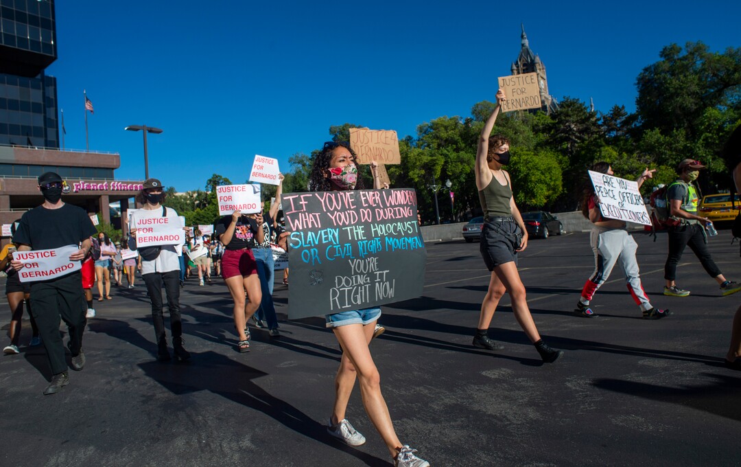 (Rick Egan  |  The Salt Lake Tribune) Marchers cut across the street to avoid the lines of Salt Lake City Police officers at each intersection during a Justice for Bernardo Palacios-Carbajal protest on Tuesday, June 23, 2020.