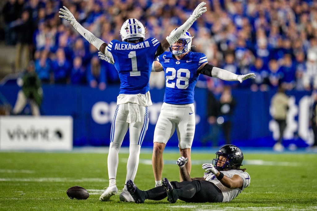 (Trent Nelson  |  The Salt Lake Tribune) BYU Cougars cornerback Therrian Alexander (1) and BYU Cougars safety Tanner Wall (28) celebrate an incomplete TCU pass as BYU hosts TCU, NCAA football in Provo on Saturday, Nov. 15, 2025.