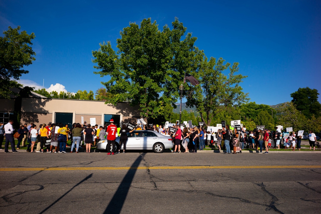 (Trent Nelson  |  The Salt Lake Tribune)A protest organized by Black Lives Matter and other groups at the Woods Cross Police Department on Friday June 14, 2019. The rally was to show support for DJ Hrubes, a 10-year-old black child who was held at gunpoint by a police officer last week while playing in his grandmother's front yard.