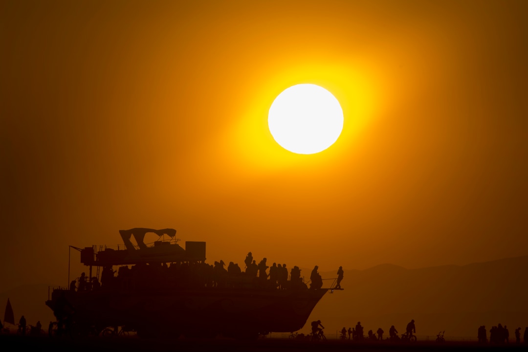 (Rick Egan  |  The Salt Lake Tribune)   An art car built like a boat, drives on the playa at Sunrise, in the Black Rock Desert in Nevada, Saturday, Sept. 1, 2018.