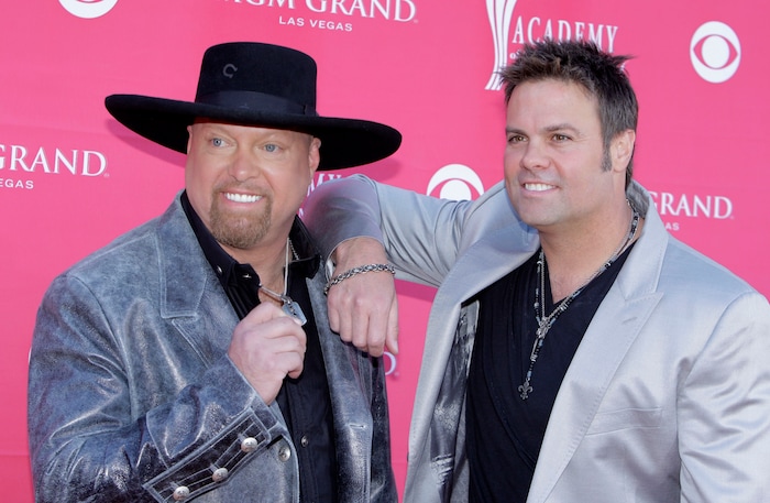Eddie Montgomery, left, and Troy Gentry, of Montgomery Gentry, arrive at the 44th Annual Academy of Country Music Awards in Las Vegas on Sunday, April 5, 2009. (AP Photo/Jae C. Hong)