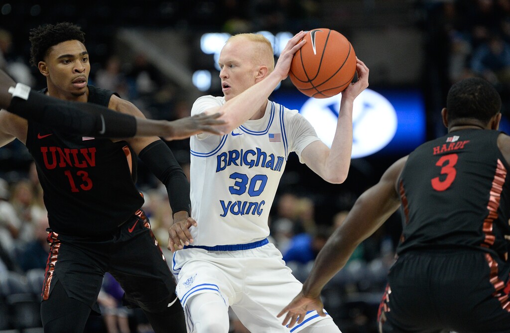 (Francisco Kjolseth  |  The Salt Lake Tribune)  Brigham Young Cougars guard TJ Haws (30) looks for an open teammate as BYU takes on UNLV in men's NCAA basketball at Vivint Smart Home Arena in Salt Lake City on Sat. Dec. 7, 2019.