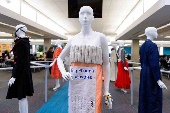 (Trent Nelson | The Salt Lake Tribune)  Megan Ulch's dress Prescribed Addiction, which is part of "Dressed to Protest," a new exhibit presented by students in Salt Lake Community College's Fashion Institute, in Taylorsville, Thursday January 18, 2018. The exhibit shows how clothing can (and has) been used as a way for social and political protest. Most of the pieces are student designs, but a few come from the Fashion Institute's historic clothing collection.