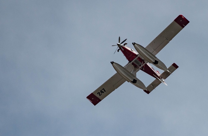 (Francisco Kjolseth  |  The Salt Lake Tribune) Air crews battle a fire in Neffs Canyon on the north side of Mount Olympus on Tuesday, Sept, 22, 2020.