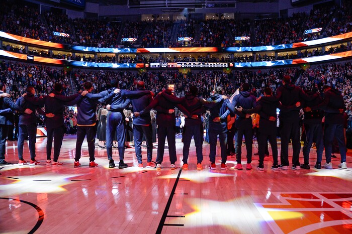 (Francisco Kjolseth  |  The Salt Lake Tribune)  The Utah Jazz embrace for the national anthem prior to their game against the Sacramento Kings in the NBA game at Vivint Smart Home Arena Wed., Nov. 21, 2018, in Salt Lake City.
