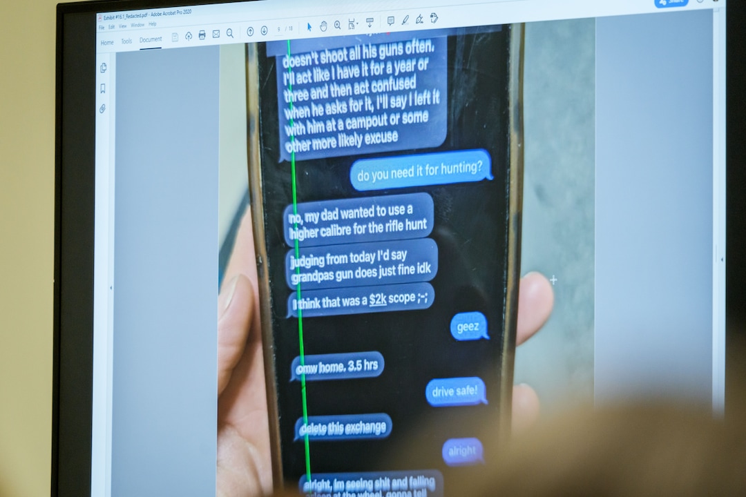 (Spenser Heaps | Pool) A photograph which prosecutors say shows a text message exchange between Tyler Robinson, who is accused in the fatal shooting of Charlie Kirk, and Robinson’s roommate and romantic partner Lance Twiggs, is shown during a preliminary hearing at the Fourth District Courthouse in Provo, Thursday, July 9, 2026.