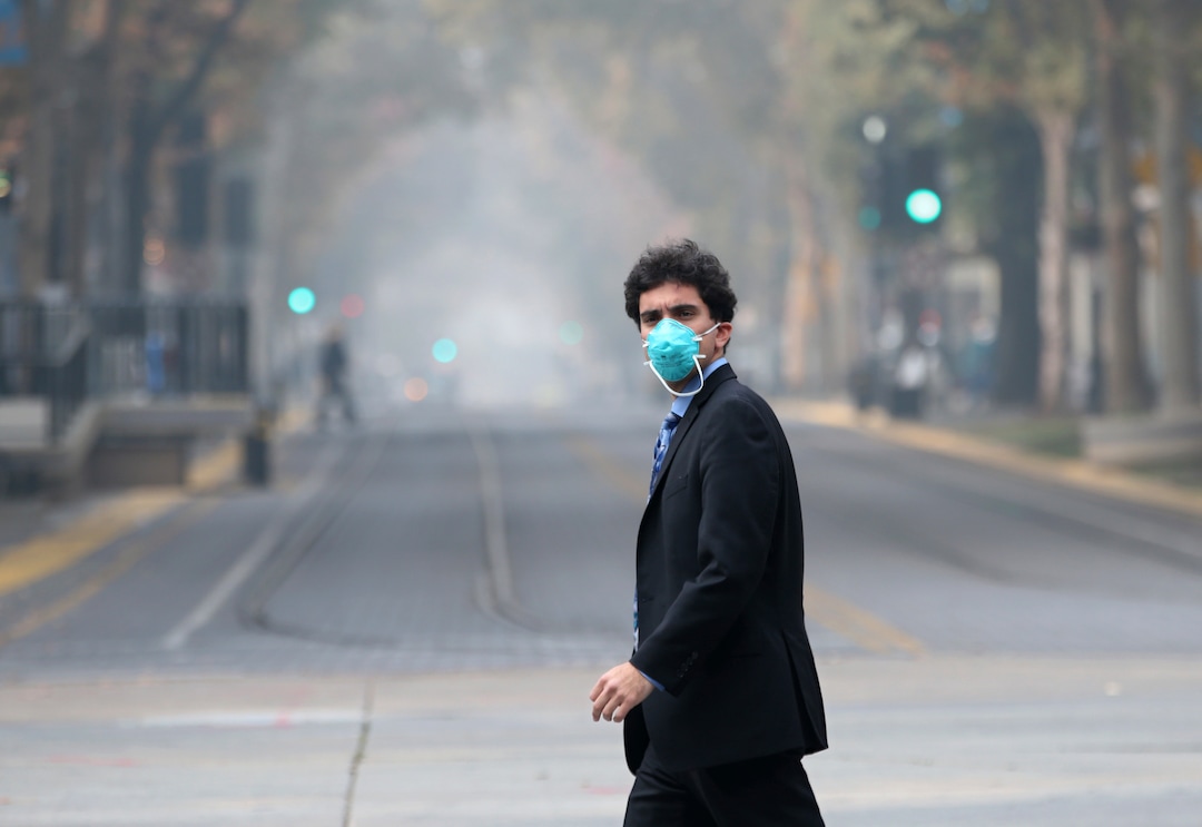 Many people don masks to deal with the smoke from the Camp Fire, Thursday, Nov. 15, 2018, in Sacramento, Calif. Smoke from the blaze that burned through the Butte County city of Paradise, is creating a health hazard that experts say could lead to an increase in serious health problems, especially for children and the elderly. (AP Photo/Rich Pedroncelli)