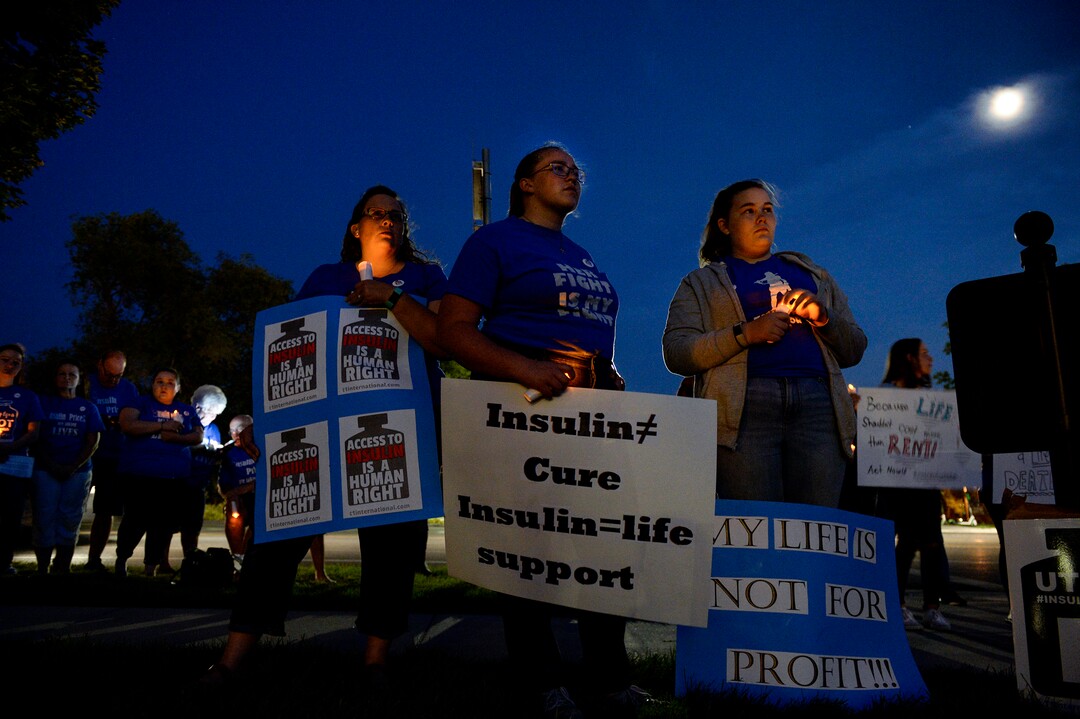 (Leah Hogsten  The Salt Lake Tribune) "It costs over $1,000 a month to keep my child alive," said Diana Thomas, left, protesting the high cost of insulin with her daughters Grace, 13, center, and Laura, 16, to the right. Grace Thomas has diabetes. Diabetes patients, their families and supporters rallied on the Capitol lawn, Saturday, Sept. 7, 2019.