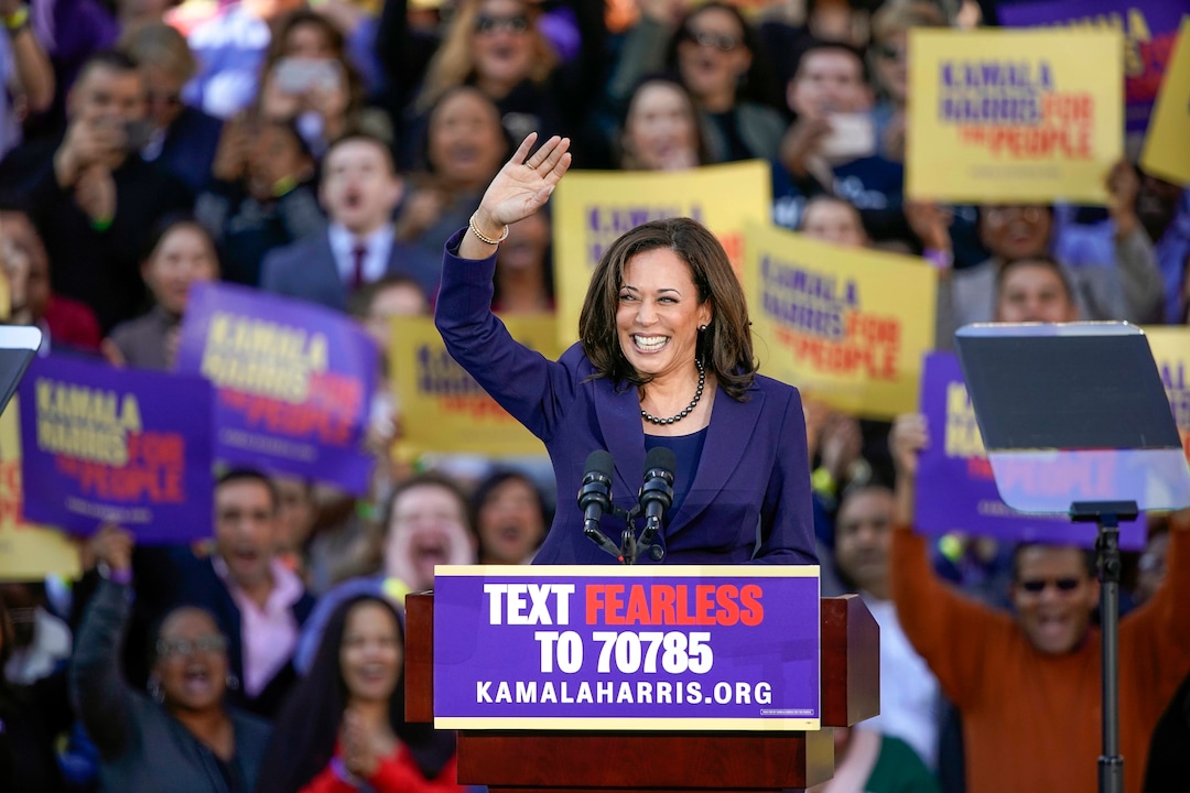 FILE - In this Jan. 27, 2019, file photo, Democratic Sen. Kamala Harris, of California, waves to the crowd as she formally launches her presidential campaign at a rally in her hometown of Oakland, Calif. Harris made history Saturday, Nov. 7,  as the first Black woman elected as vice president of the United States, shattering barriers that have kept men — almost all of them white — entrenched at the highest levels of American politics for more than two centuries. (AP Photo/Tony Avelar, File)