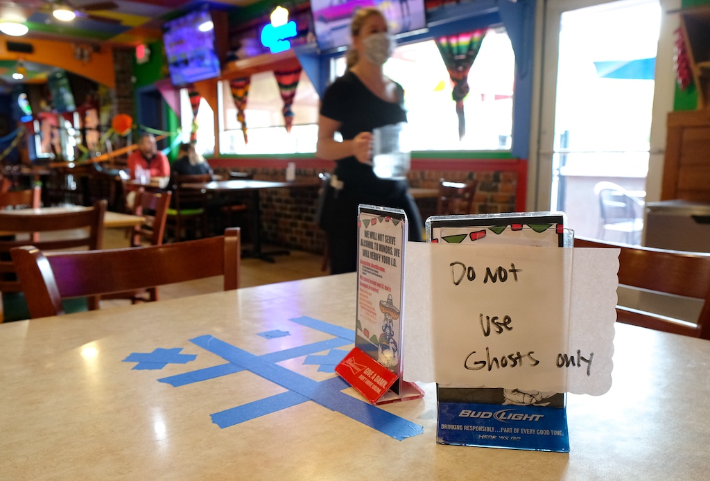 (Francisco Kjolseth  |  The Salt Lake Tribune) El Chihuahua Mexican restaurant in Salt Lake City opens their restaurant with limited dining on Friday, May 1, 2020. They have removed about half the tables and have some on a patio as Utah restaurants can now open their dining rooms for sit-down service, with heavy restrictions, including fewer tables (to keep patrons 6-feet apart) and face masks for employees due to COVID-19.