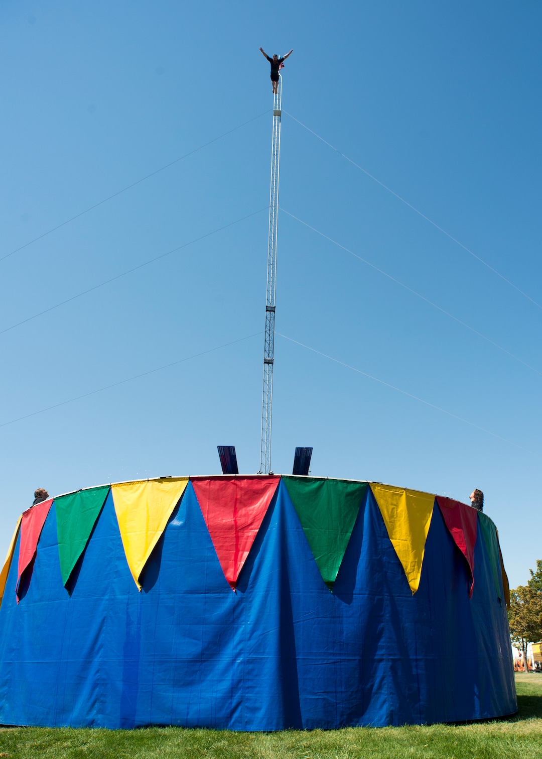 (Rick Egan  |  The Salt Lake Tribune)      Simon Sarabura dives 80 feet into ten feet of water, during the Flying Fools High Dive show, on opening day of the Utah State Fair, Thursday, Sept. 6, 2018.