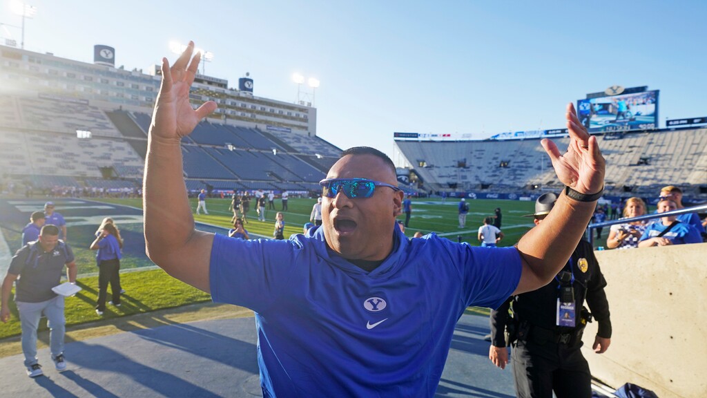 (Rick Bowmer | AP) BYU head coach Kalani Sitake arrives on the field before an NCAA college football game against Cincinnati Friday, Sept. 29, 2023, in Provo.