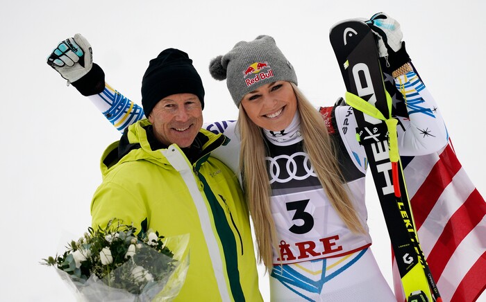United States' Lindsey Vonn, right, celebrates her third place with Sweden former skier Ingemar Stenmark after the women's downhill race, at the alpine ski World Championships in Are, Sweden, Sunday, Feb. 10, 2019. (AP Photo/Giovanni Auletta)